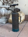 Antico spruzzatore da giardino